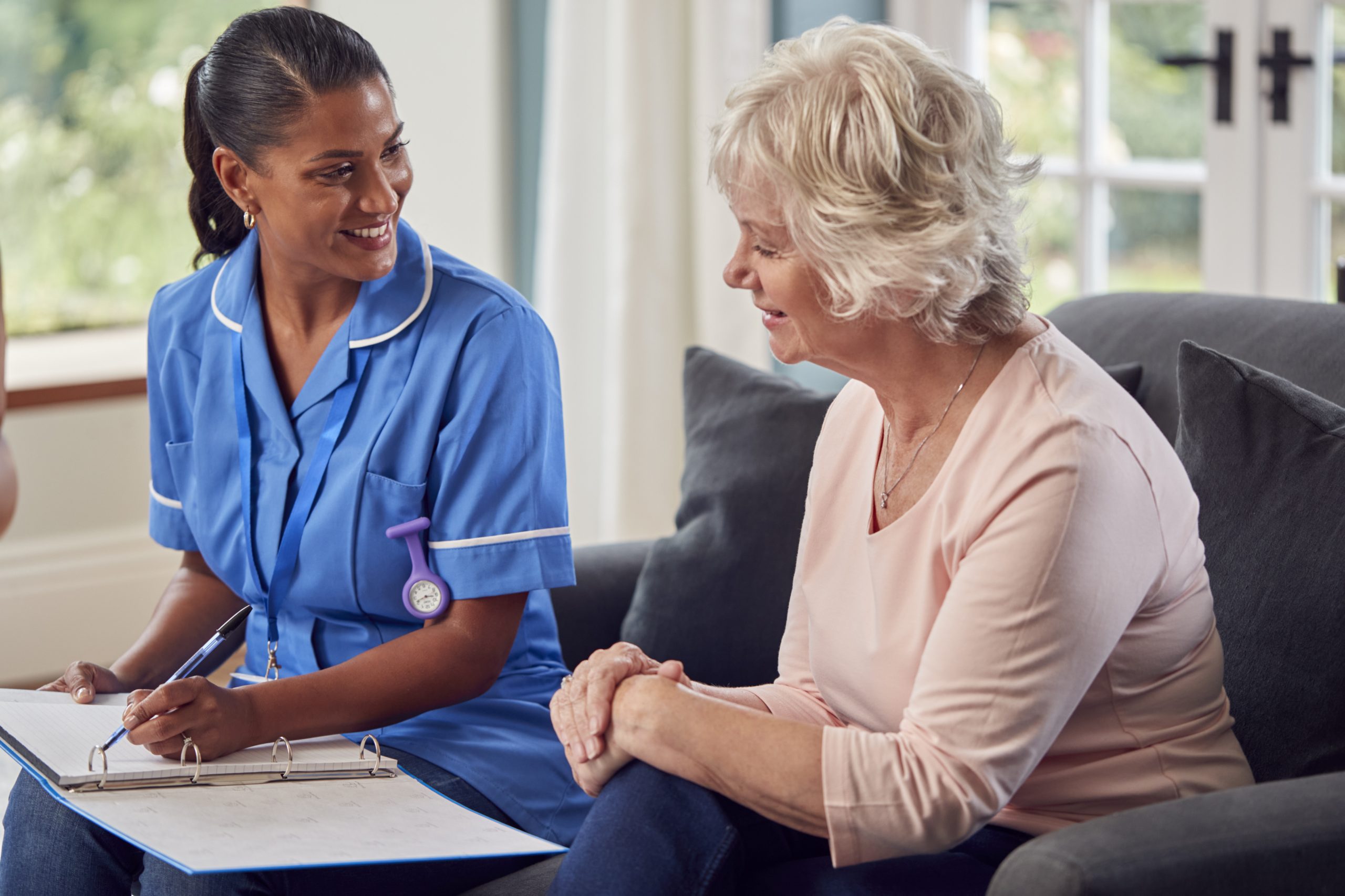 Senior Woman At Home Talking